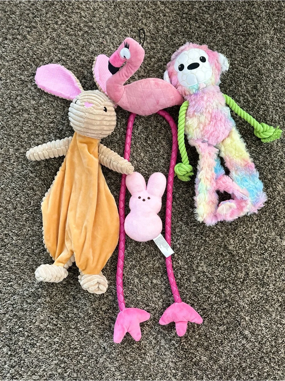 interactive and plush dog toys designed for fetching, tugging, and chewing
